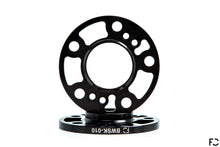 Load image into Gallery viewer, A straight-on view of the Future Classic BMW wheel spacer pocketing, lug bolt holes, and hub bolt hole provisions