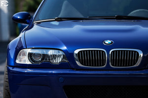 Straight on view of BMW chrome kidney grille set on Interlagos Blue E46 M3