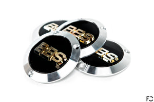 BBS E88 Center Cap Adaptor Set angled stack with black / gold 3D caps