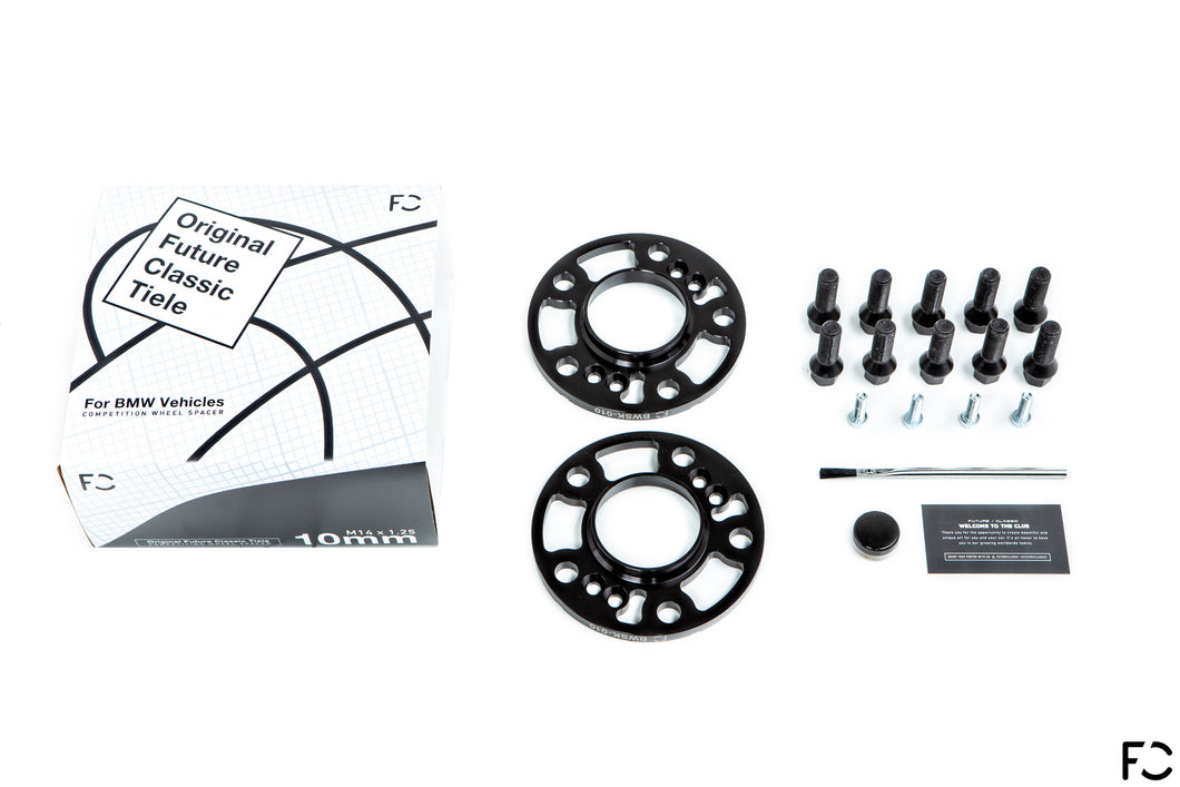 Everything included in the Future Classic wheel spacer set for BMW models: wheel spacer pair, lug bolts, hub bolts, applicator brush, Copaslip copper anti-seize