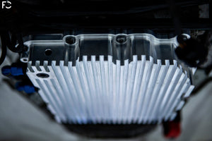 Fall-Line Motorsports Aluminum DCT Oil Pan - raw prototype pan installed underside view showing extended fin direction